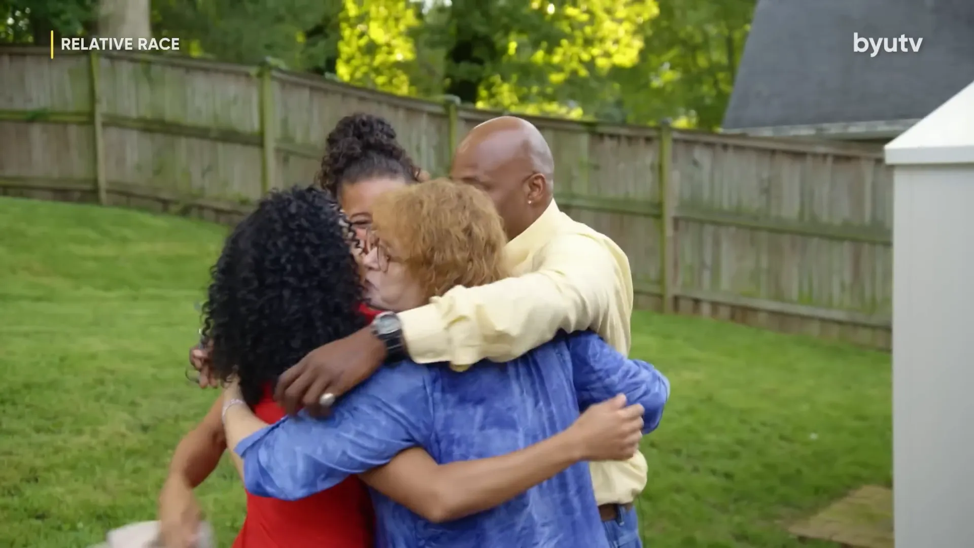 Mother, father, and daughter together—capturing the joy of a reunited family.