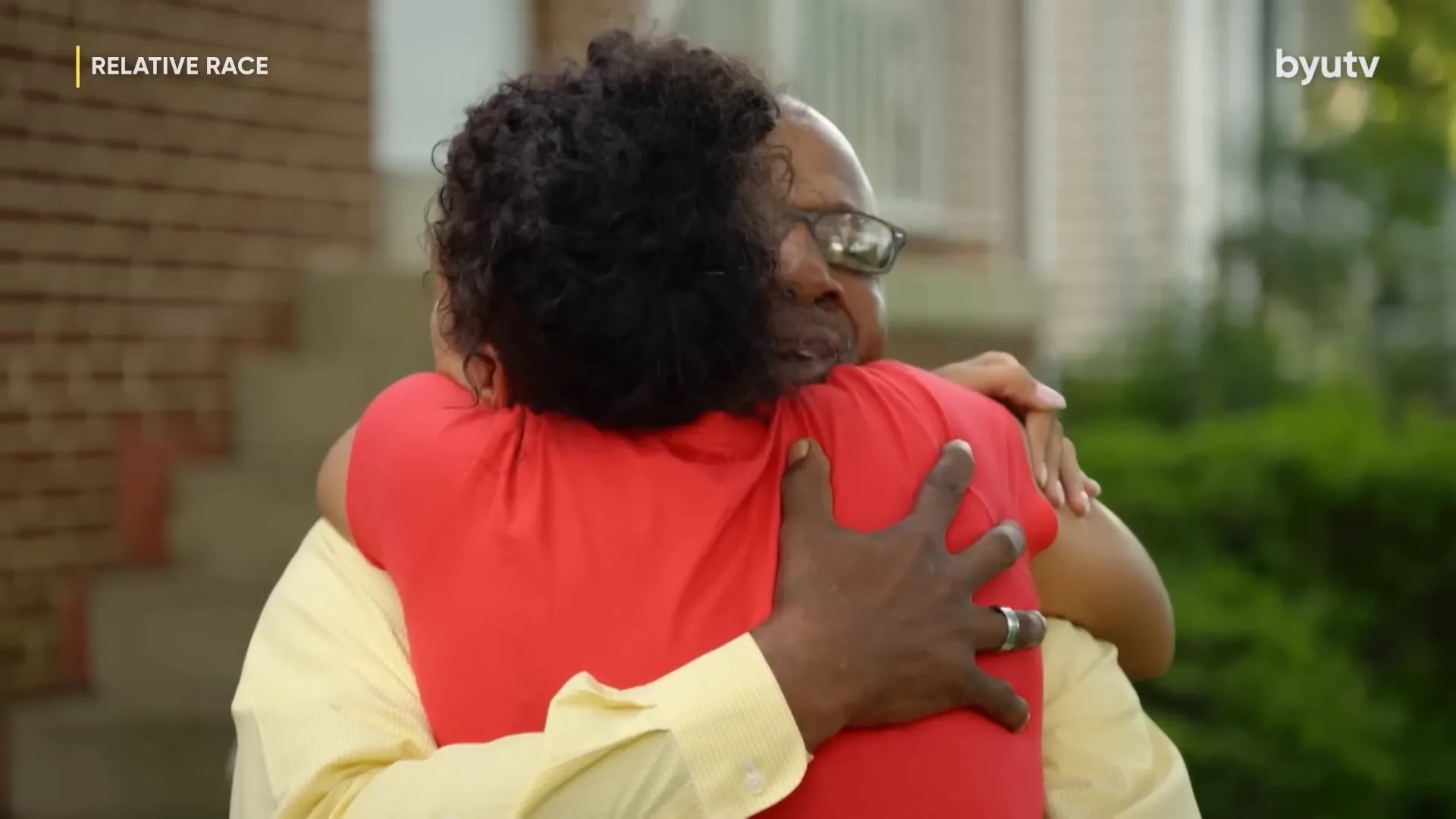 A close-up of Dennis and Maria sharing a quiet, emotional moment.