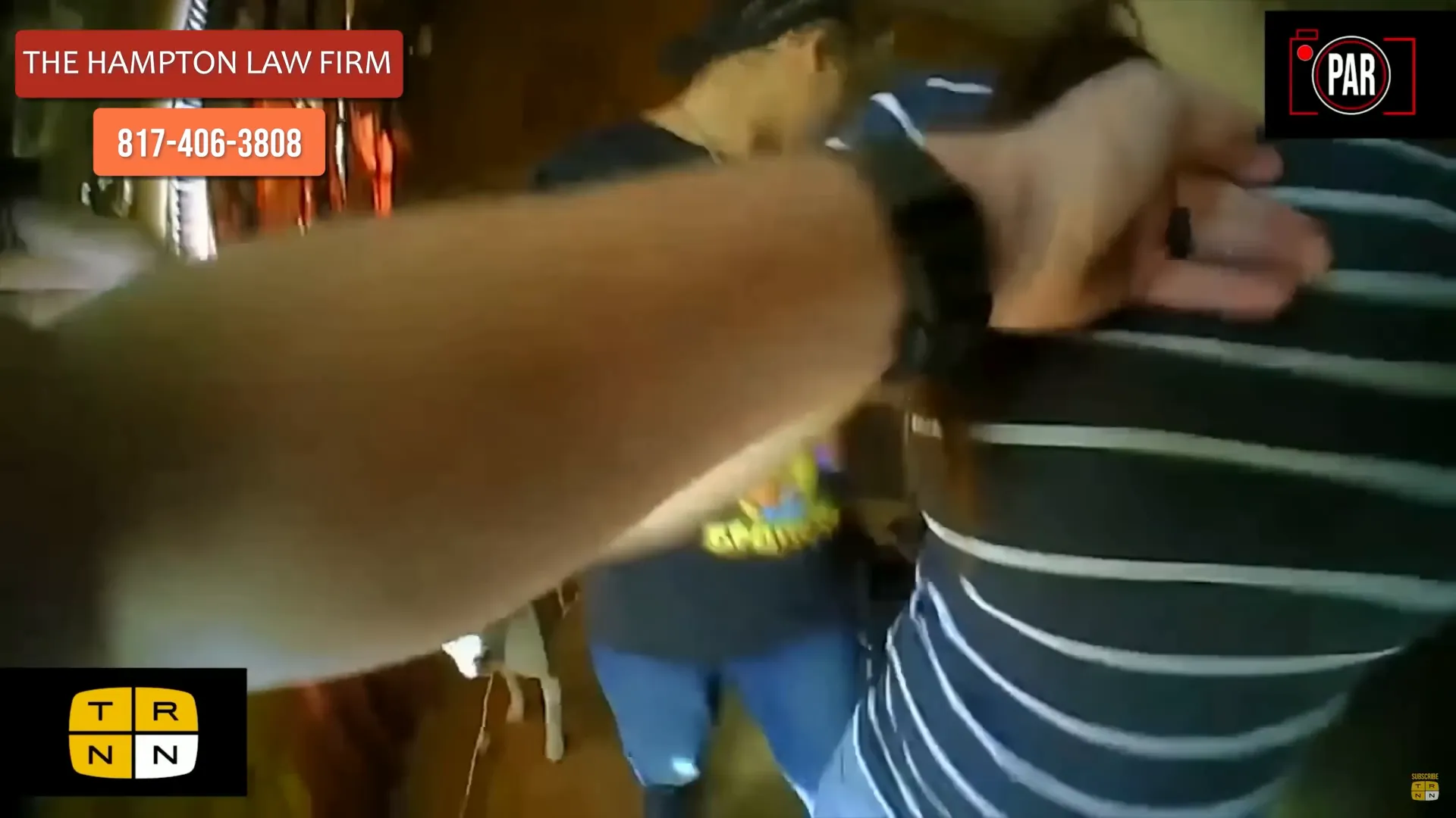 Police arresting a young man over noise complaint