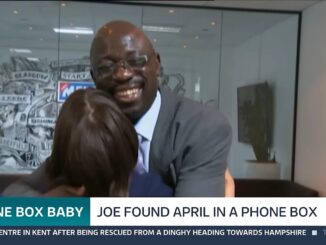 Joe Campbell smiling as he embraces April during their 2016 reunion